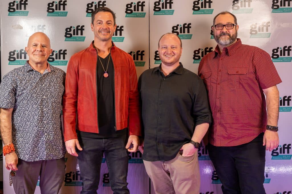 Fusion Media AI team and panelists at the Gasparilla International Film Festival 2026 step-and-repeat, four men in front of the GIFF backdrop.